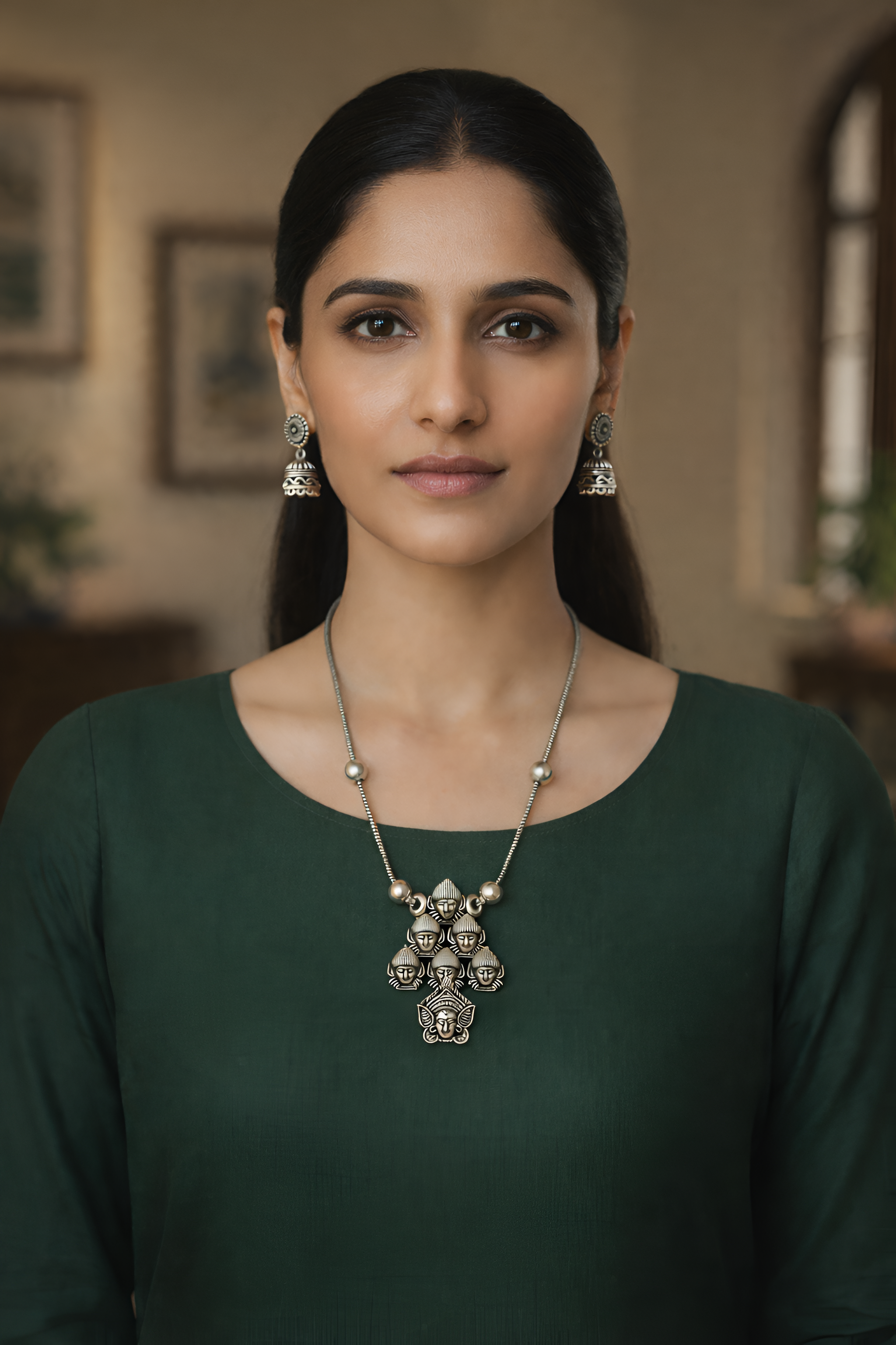 Handcrafted oxidised silver deity pendant neckpiece worn for elegant ethnic styling
