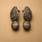 Oxidised silver heritage stud earrings with traditional detailing
