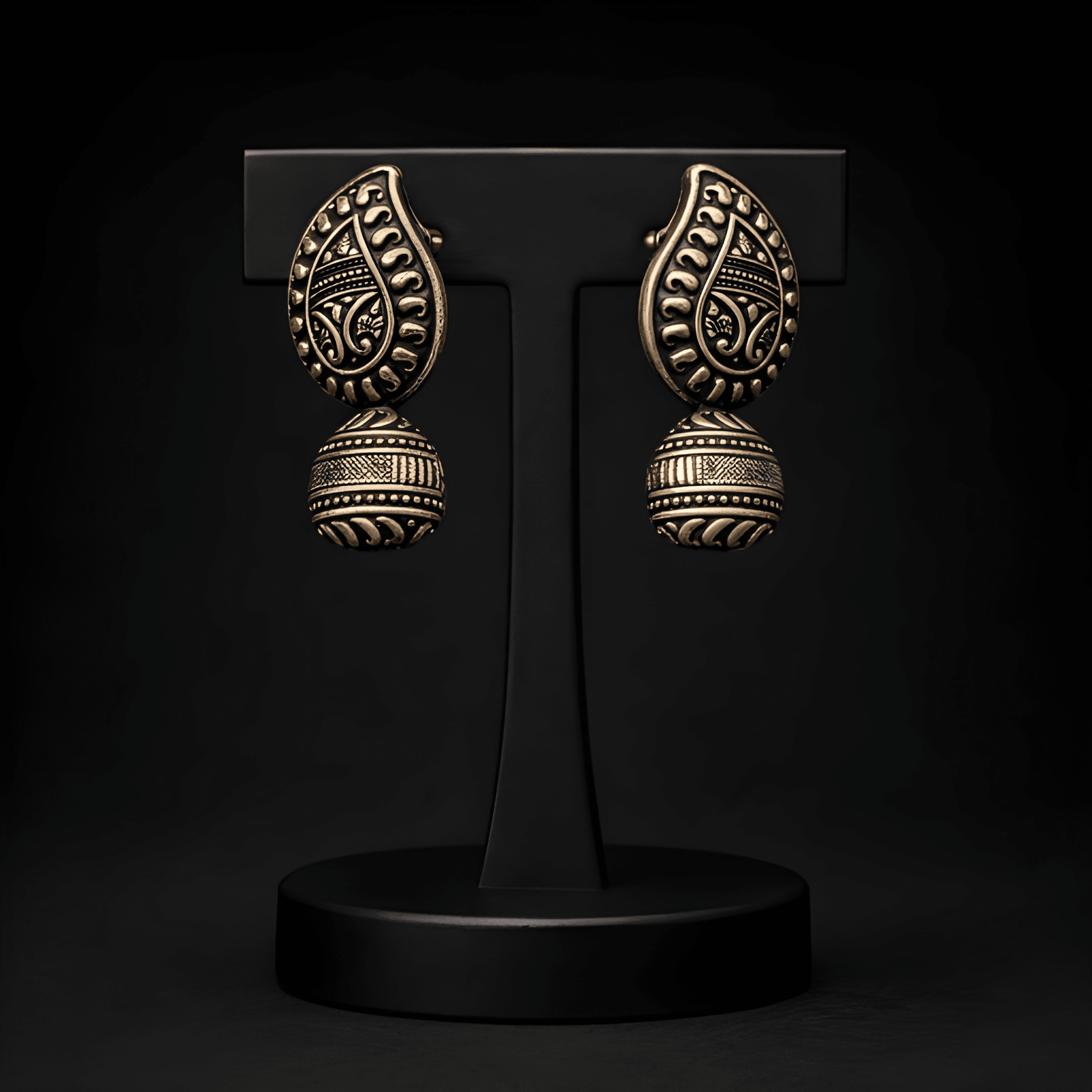 Heritage stud earrings displayed on black jewellery stand
