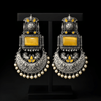 Monalisa stone oxidised silver earrings displayed on black stand | Color: Yellow
