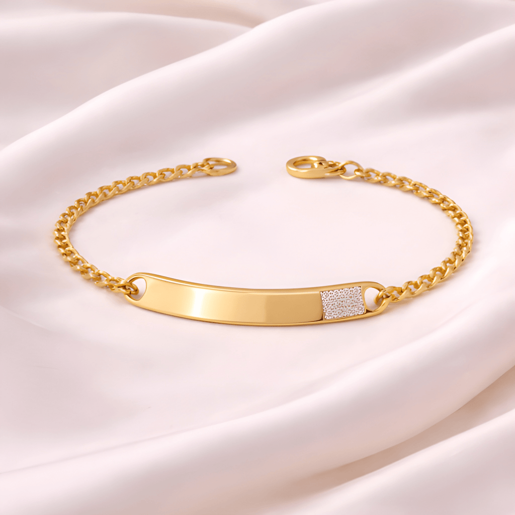 Minimal gold ID bracelet with diamond accent on ivory silk background | Kayahh Jewels
