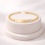 Gold ID bracelet with diamond accent displayed on minimal ivory jewellery stand | Kayahh Jewels