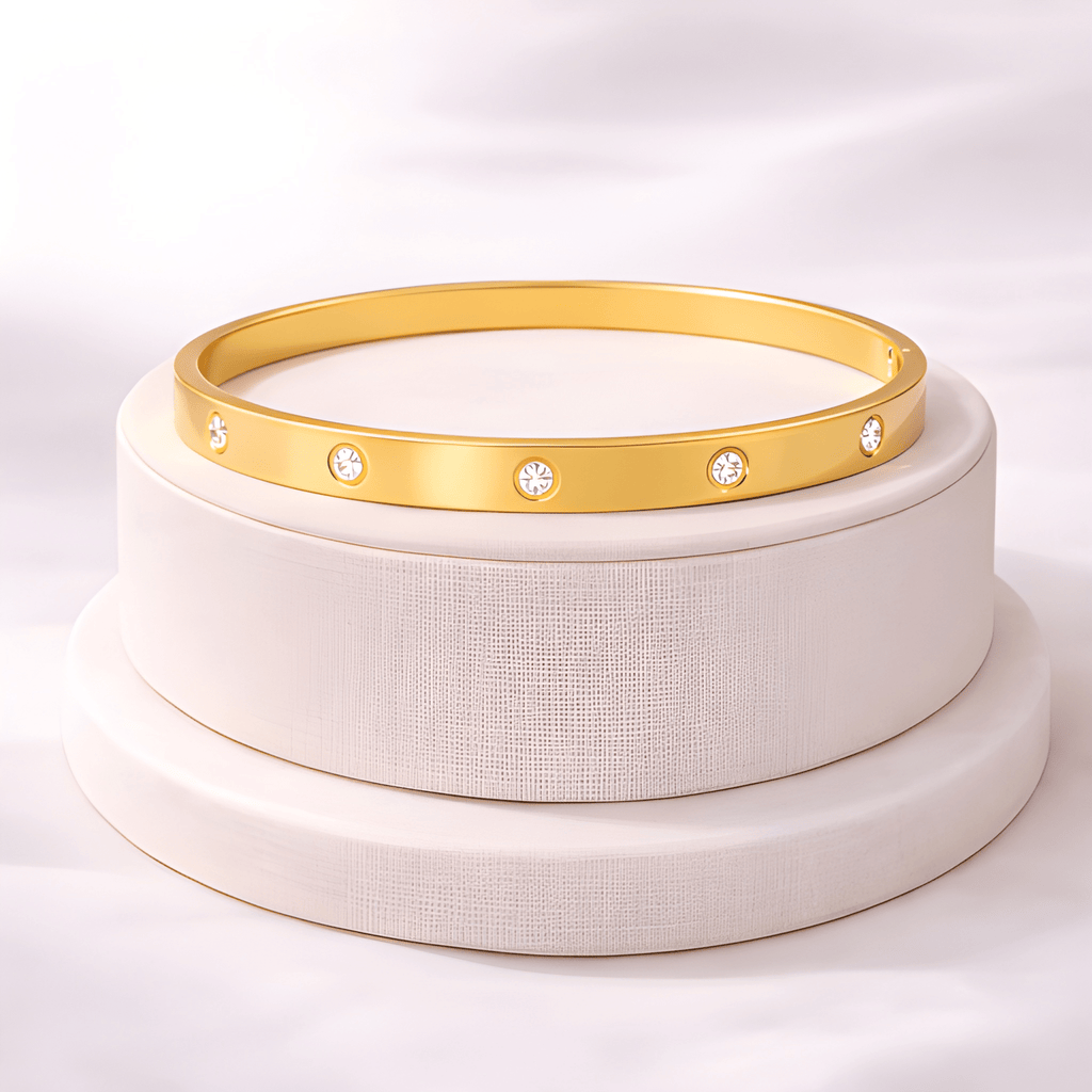 Crystal gold bangle bracelet displayed on ivory jewellery stand | Kayahh Jewels