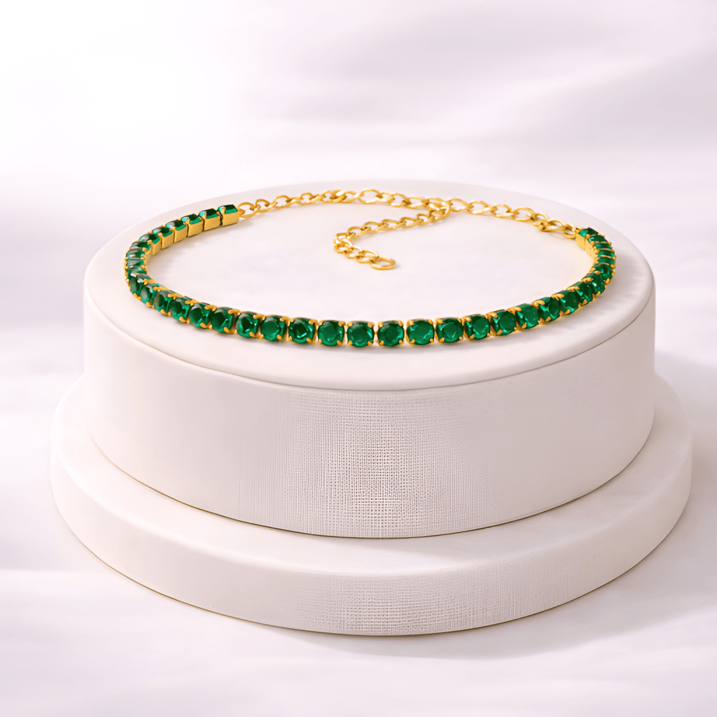 Emerald green tennis bracelet displayed on ivory jewellery stand | Kayahh Jewels
