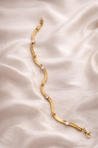 Studded chain bracelet with crystal accents on ivory silk background | Kayahh Jewels