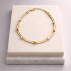 Studded chain bracelet displayed on ivory jewellery stand | Kayahh Jewels