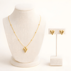 Gold pointed heart pendant necklace set displayed on ivory jewellery stand | Kayahh Jewels