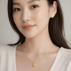 Woman wearing pointed heart pendant necklace and pointed heart stud earrings | Kayahh Jewels