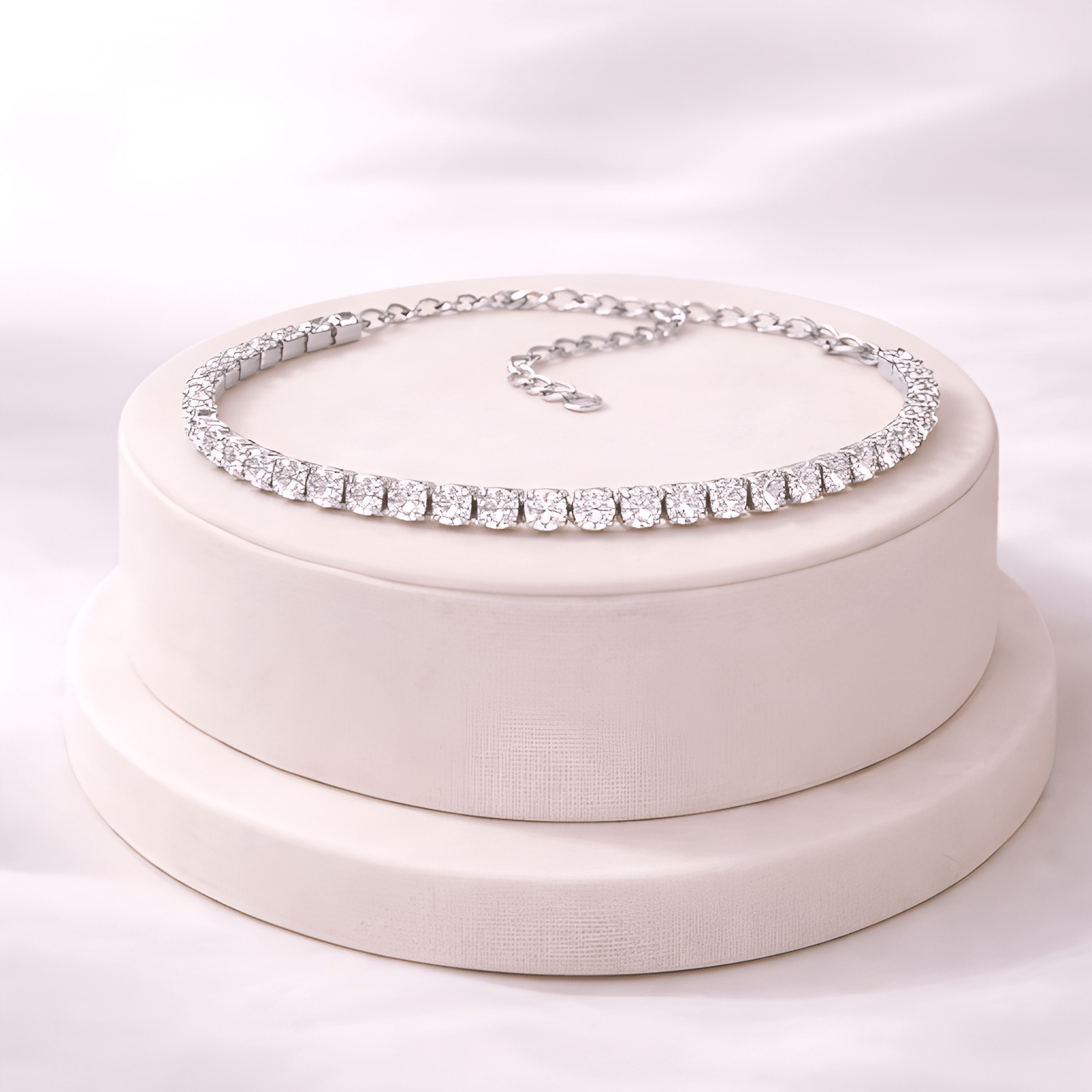 Silver crystal tennis bracelet displayed on ivory jewellery stand | Kayahh Jewels