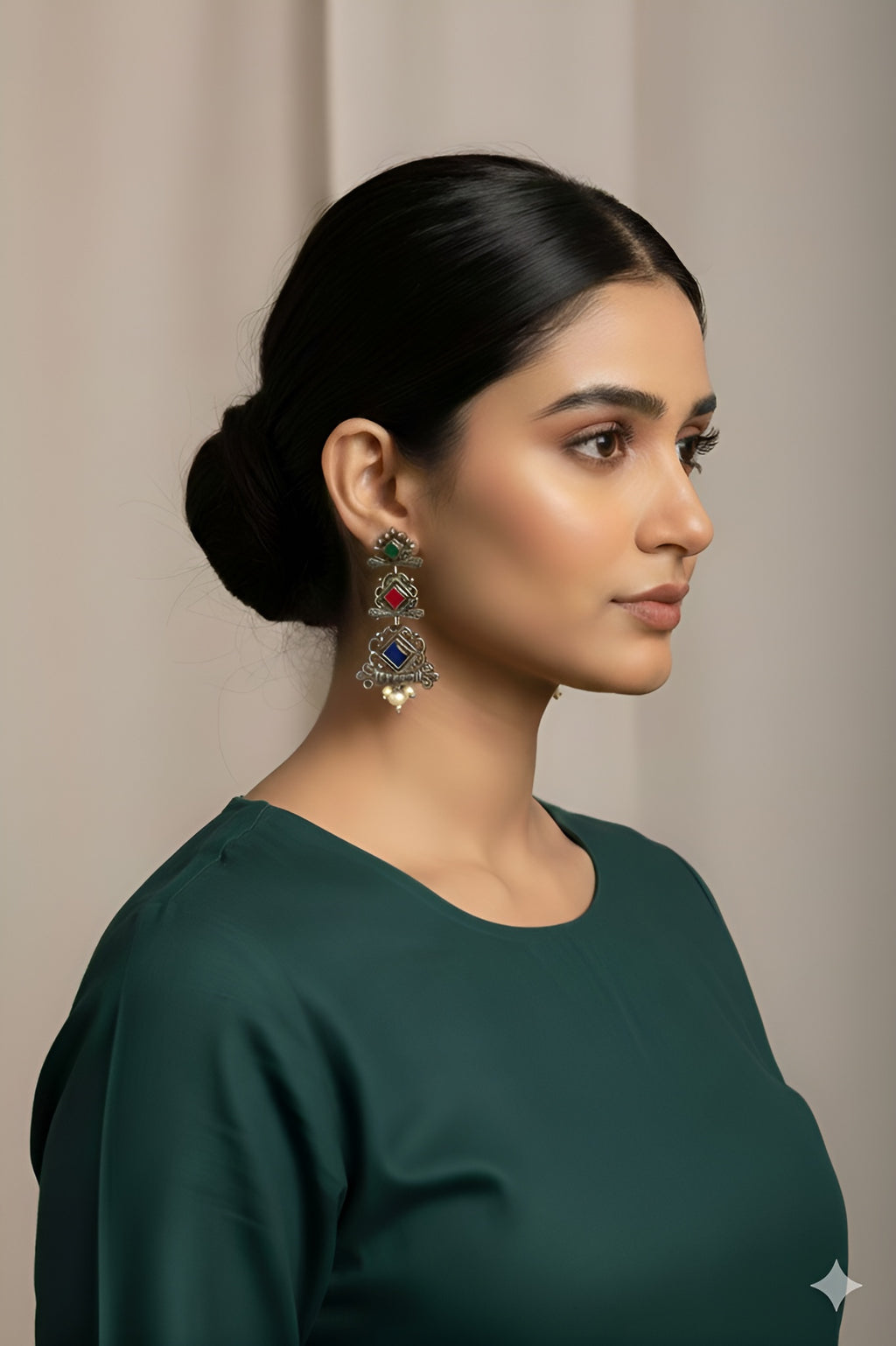 Woman wearing traditional chandelier dangler earrings for festive styling
