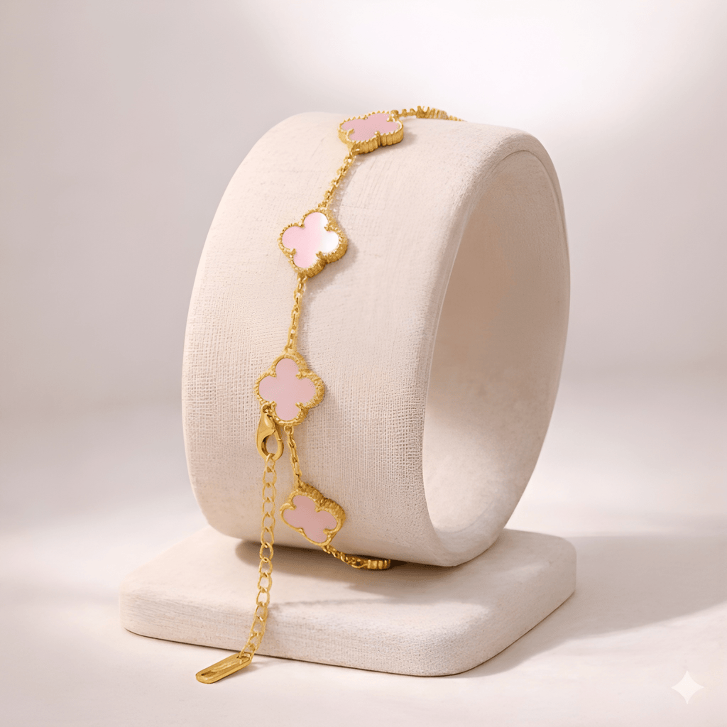 Blush pink clover gold bracelet on minimal ivory jewellery stand | Kayahh Jewels