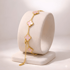 Blush pink clover gold bracelet on minimal ivory jewellery stand | Kayahh Jewels
