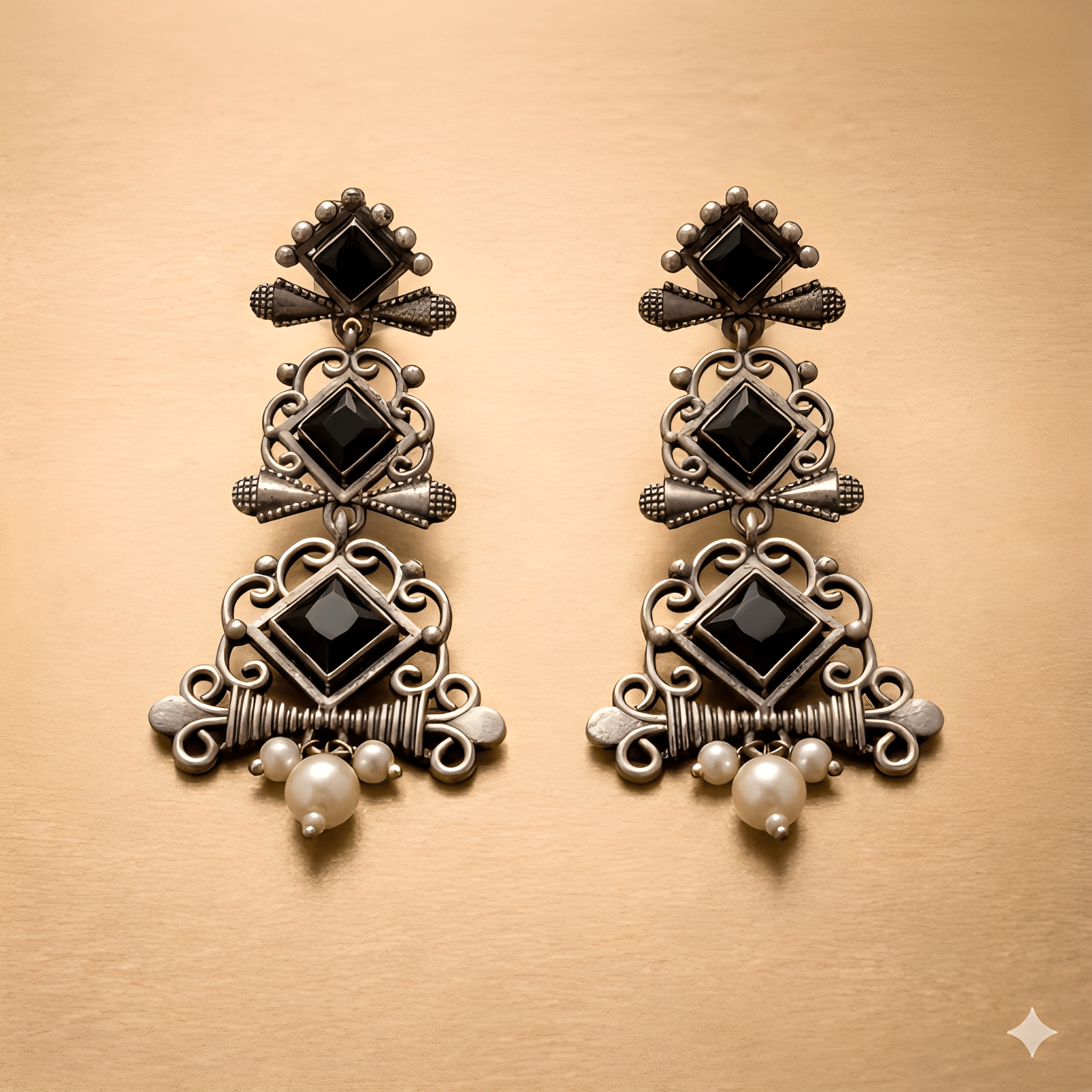 Traditional chandelier dangler earrings with layered geometric design and pearl drop
