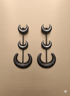 Chandra crescent statement earrings with hammered textured crescent on golden background
