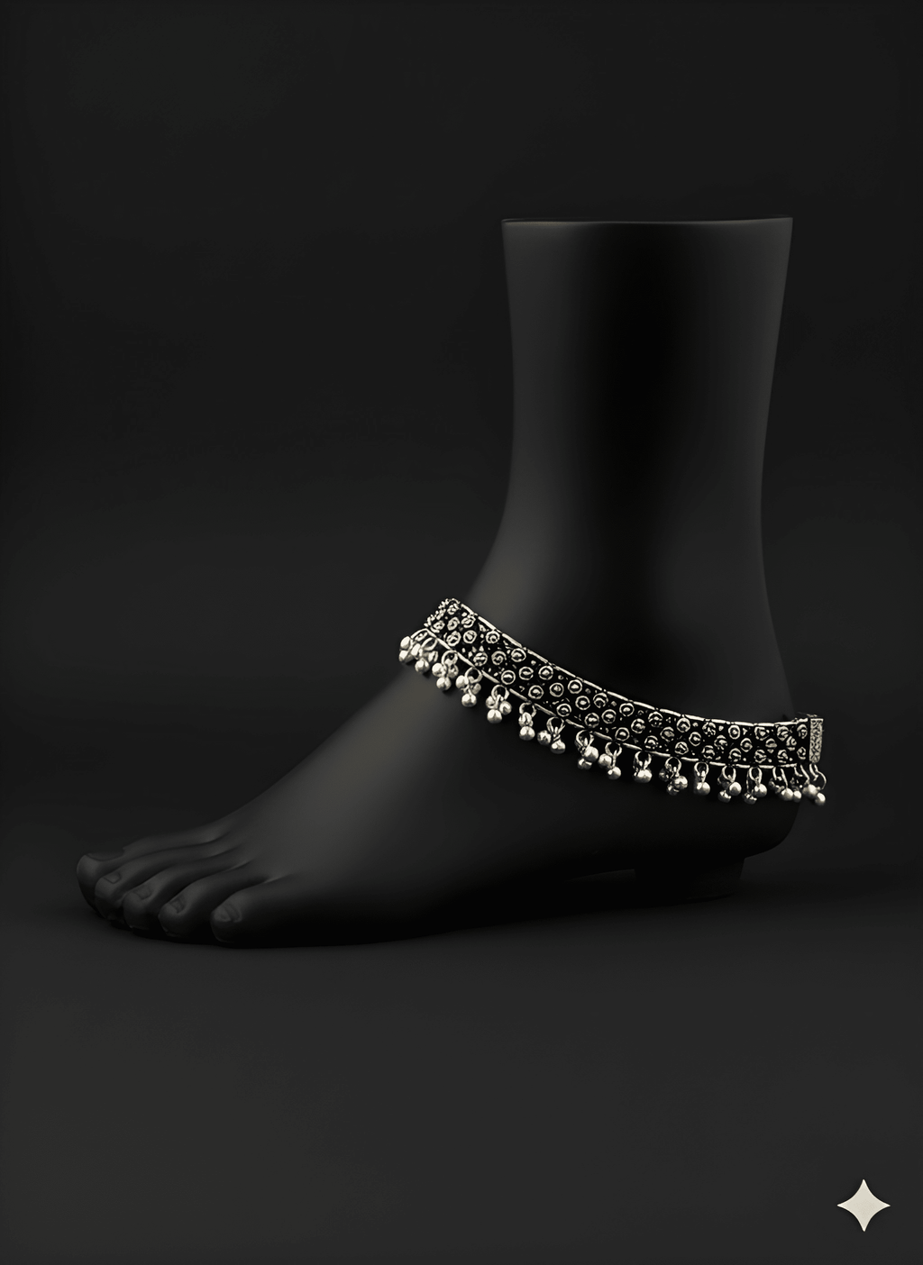 Detailed view of spacing karigari oxidised silver anklet displayed on ankle stand
