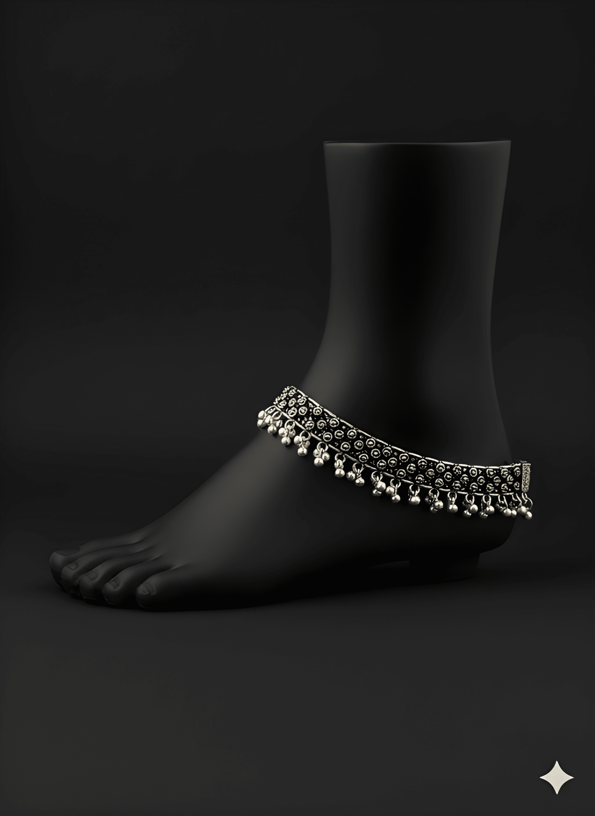 Detailed view of spacing karigari oxidised silver anklet displayed on ankle stand
