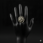 Handcrafted ghungroo medallion oxidised silver statement ring displayed on black hand