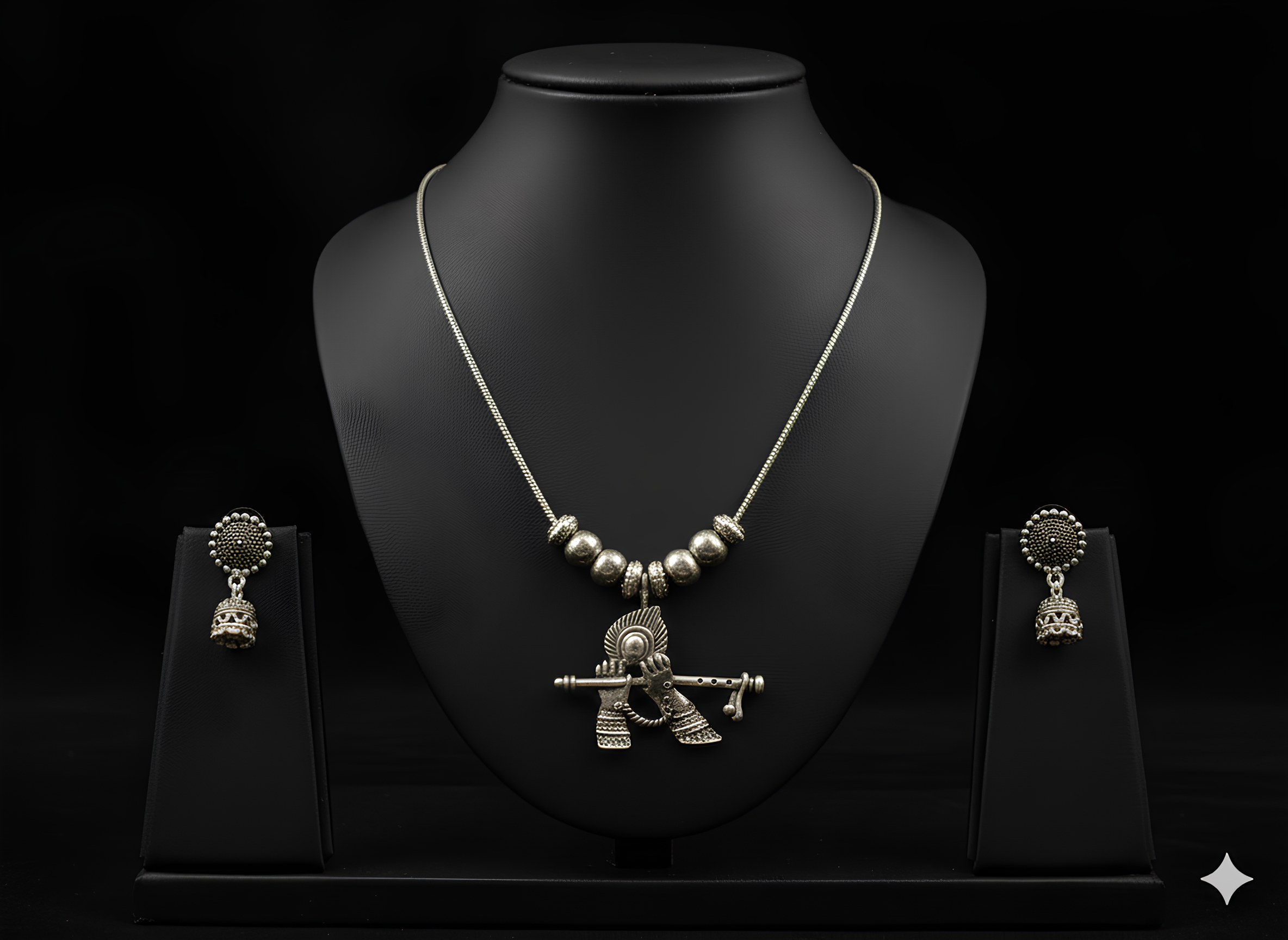 Handcrafted oxidised silver Krishna pendant neckpiece displayed on bust stand