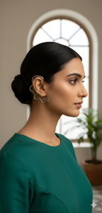 Woman wearing handcrafted serpent ear cuff earrings by Kayahh Jewels
