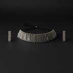 Detailed set of handcrafted oxidised silver beaded choker neckpiece with matching earrings on black background
