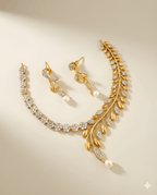 Aurelia leaf crystal necklace set with pearl drop flat lay