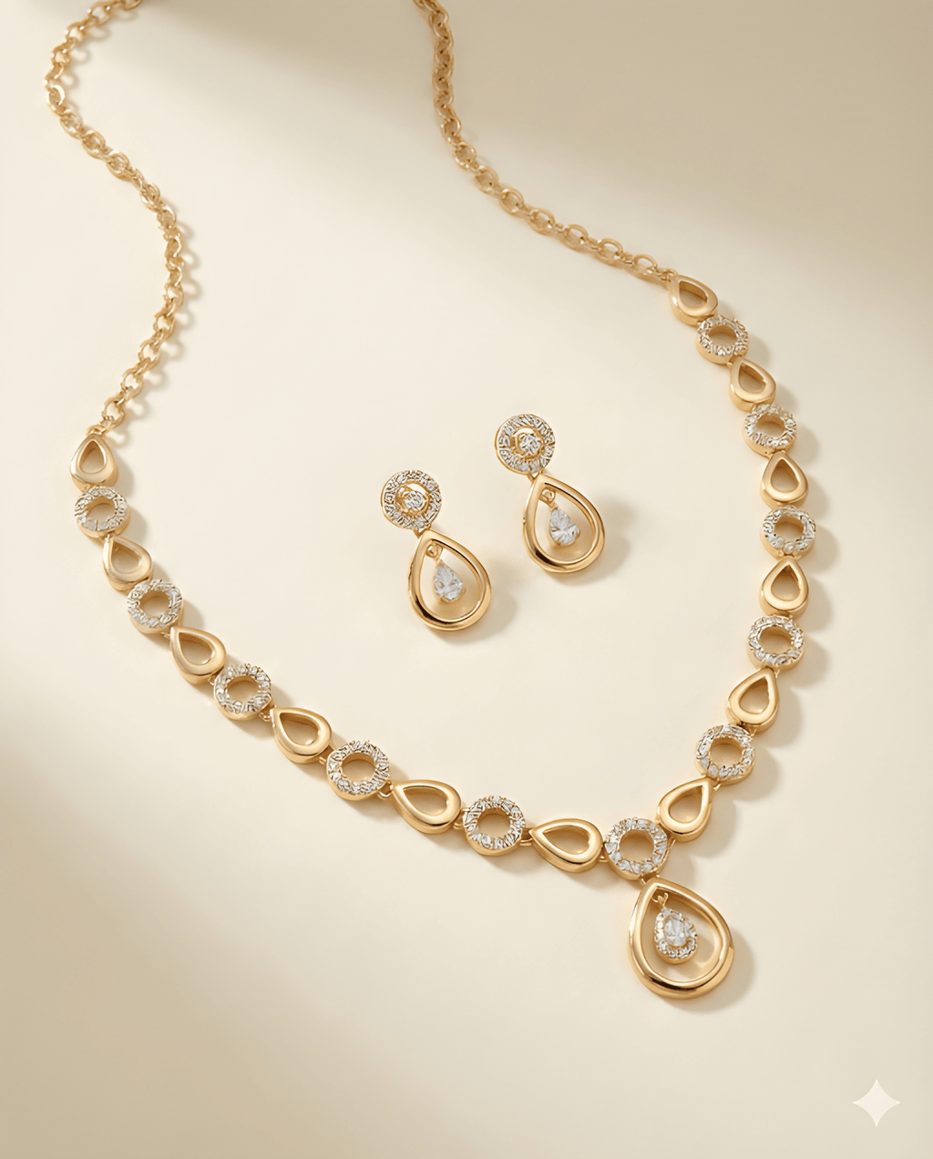 Seraphina pear crystal necklace set with matching earrings flat lay