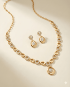 Seraphina pear crystal necklace set with matching earrings flat lay