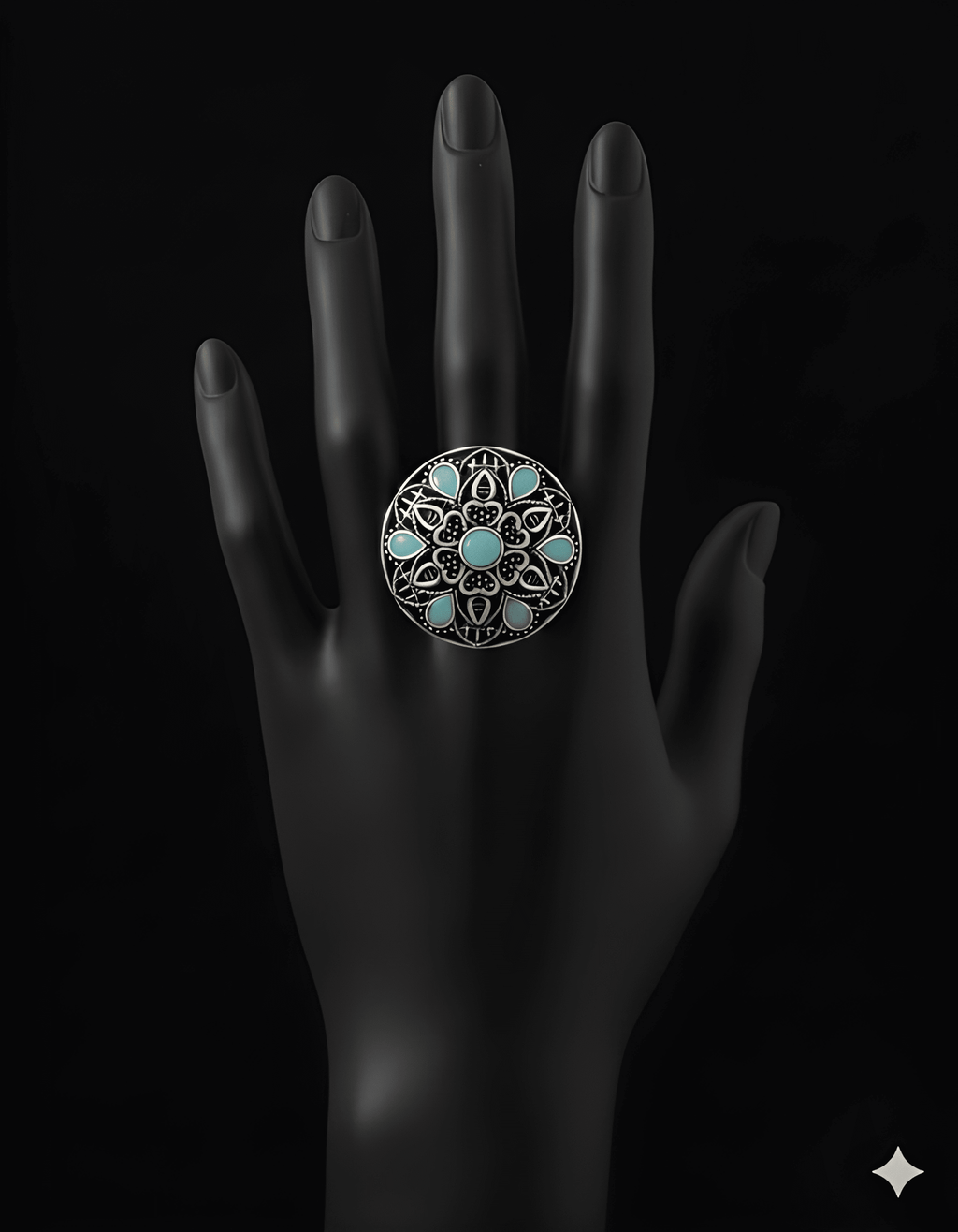 Handcrafted mandala stone statement ring with intricate detailing on black hand display