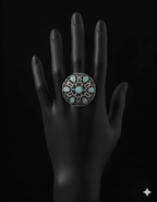 Handcrafted mandala stone statement ring with intricate detailing on black hand display