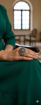 Teardrop detail oxidised silver statement ring styled with elegant ethnic outfit