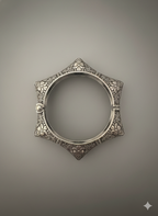 Top view close-up of floral engraved detailing on handcrafted oxidised silver cuff bracelet
