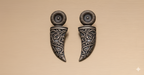 Carved dagger drop earrings with engraved detailing in oxidised silver finish
