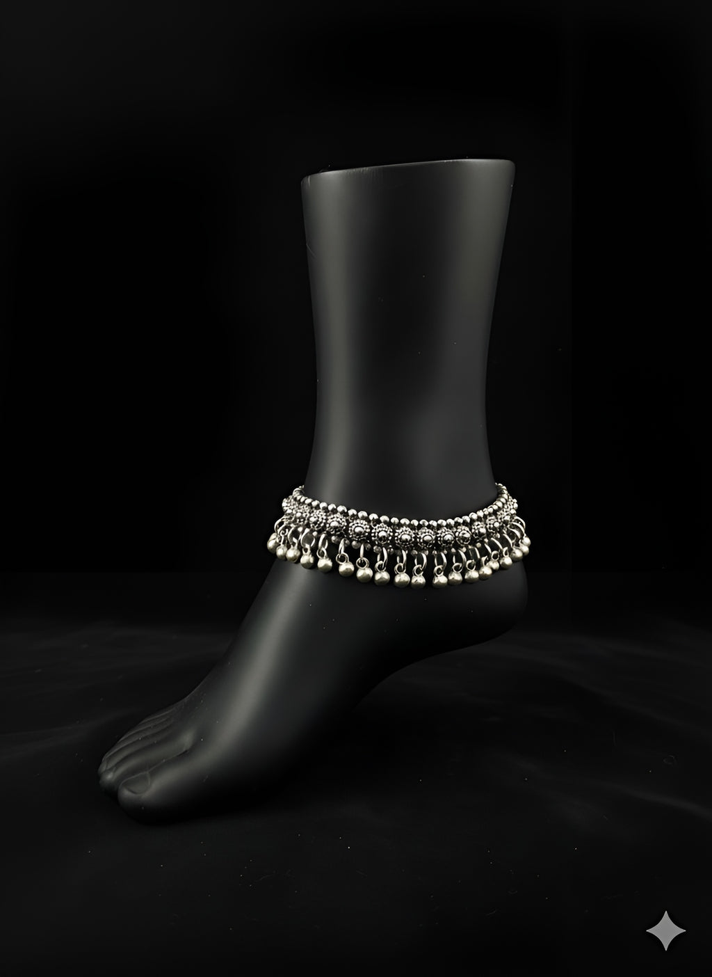 Detailed view of handcrafted oxidised silver ghungroo anklet with karigari detailing
